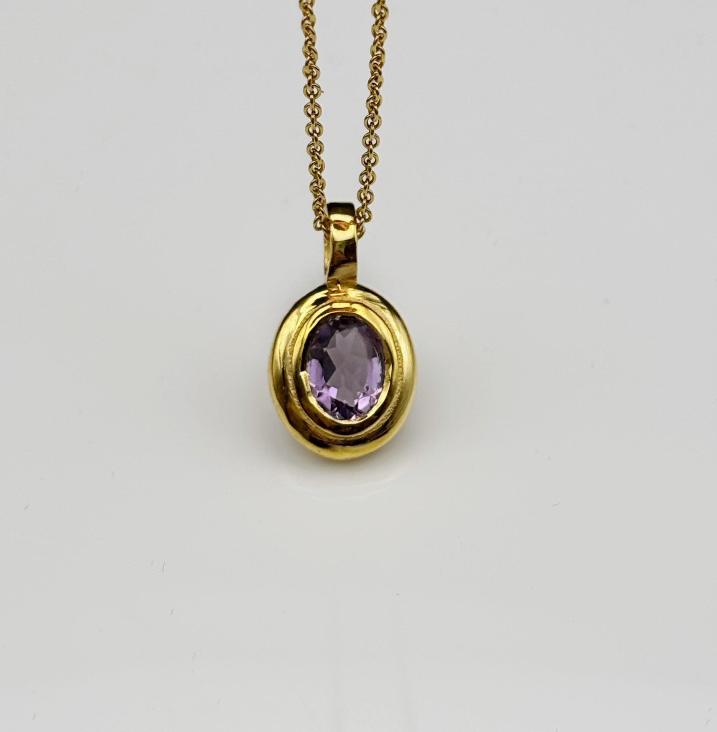 Natural Amethyst February birthstone pendant in polished brass, handmade in Australian studio