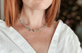 Full length view of the aquamarine necklace showing the gradient of the blue gemstone beads