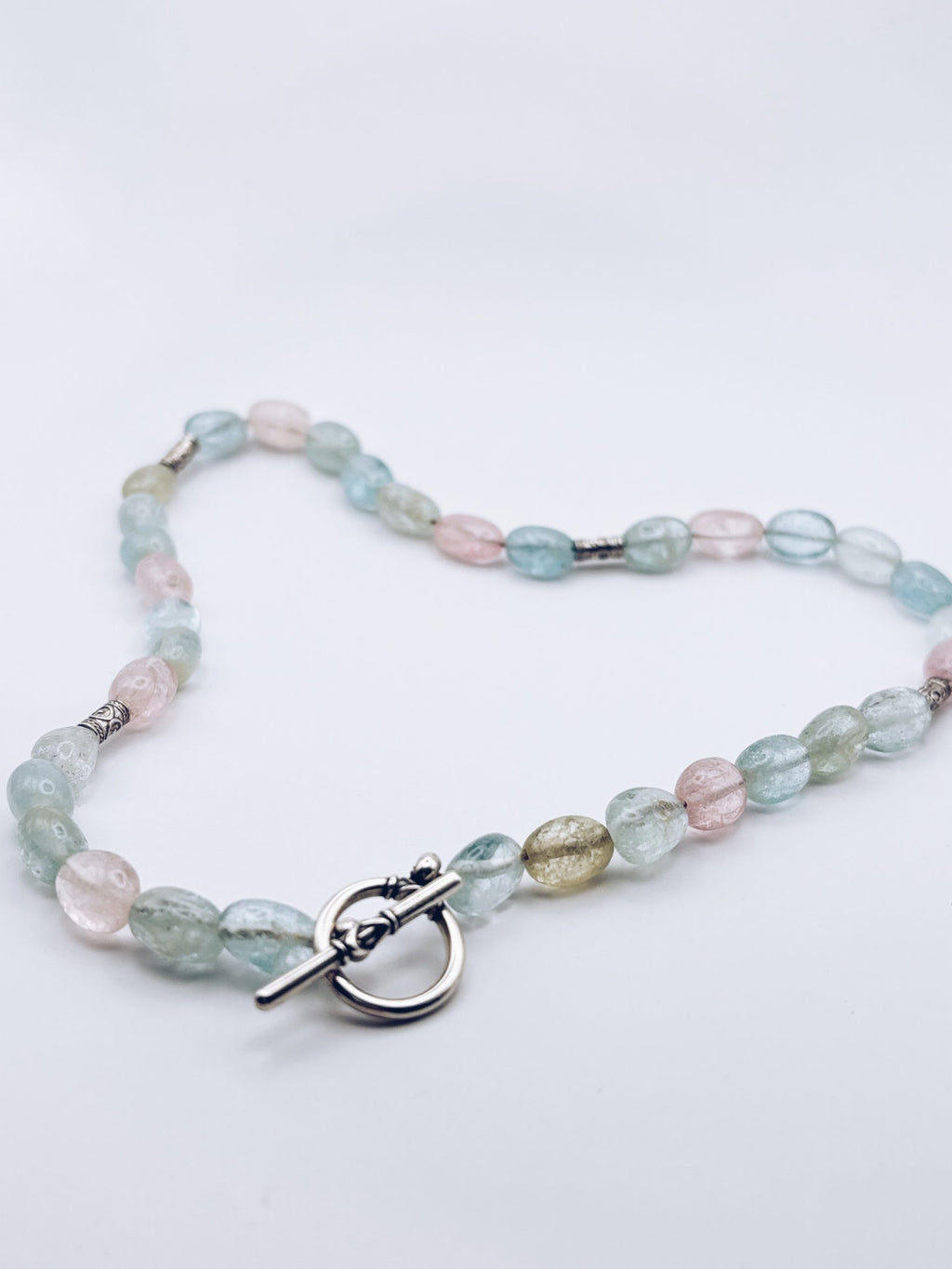 Natural aquamarine beaded necklace with a solid sterling silver lock, handmade in my Australian studio