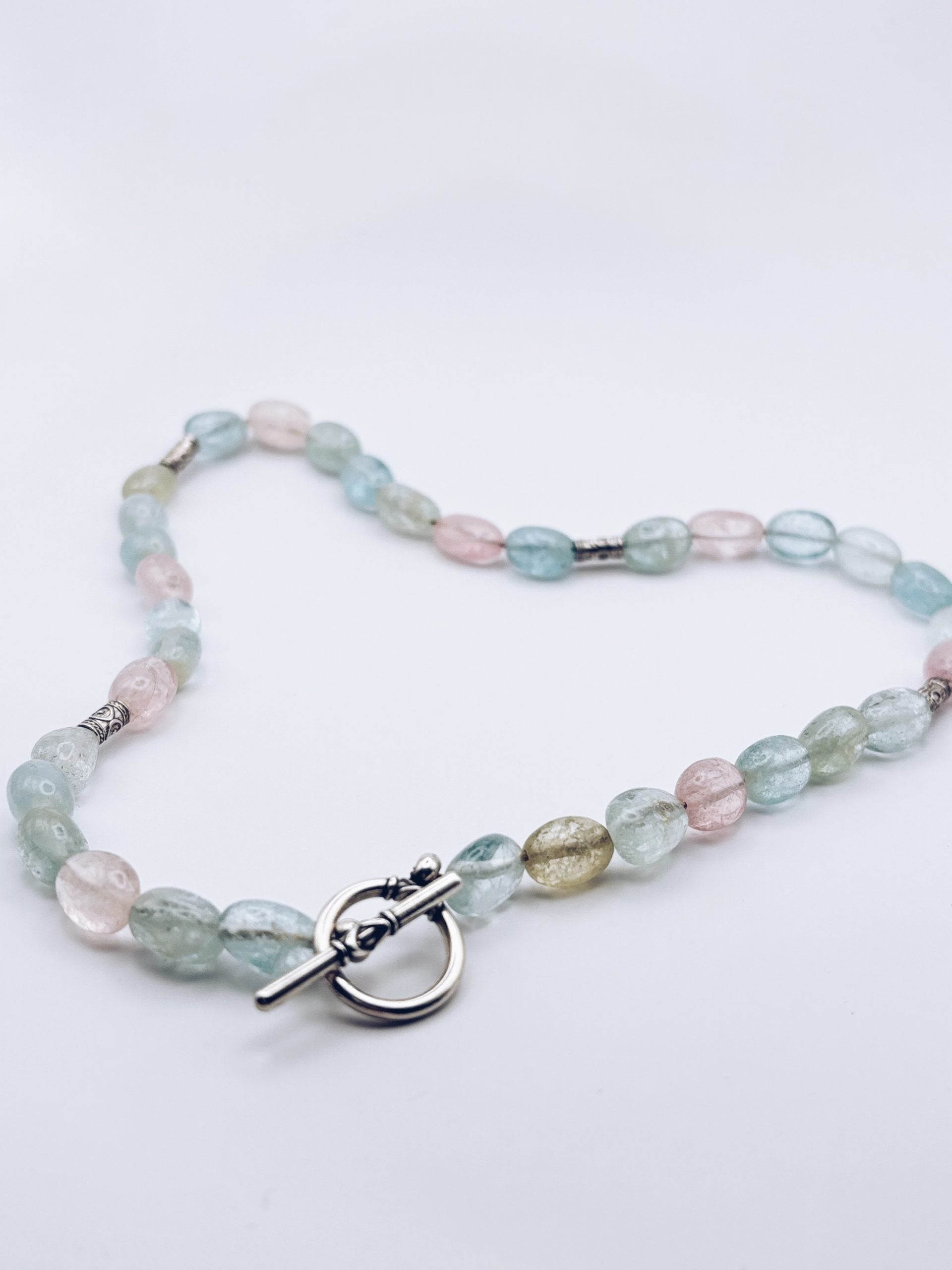 Natural aquamarine beaded necklace with a solid sterling silver lock, handmade in my Australian studio