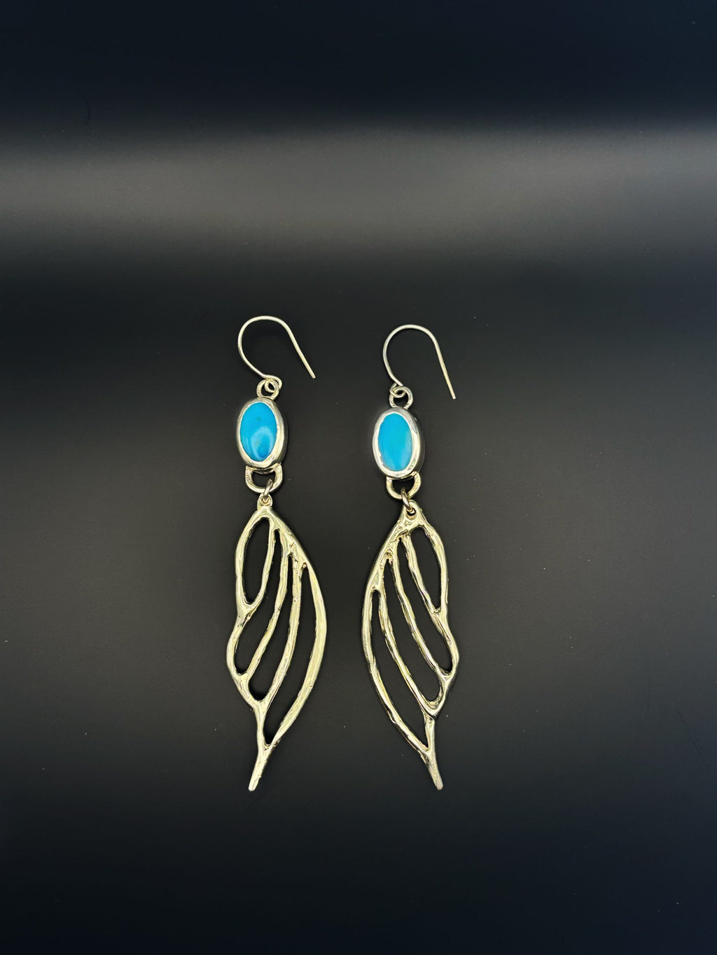 Handmade sterling silver fairy wing earrings with natural turquoise, handcrafted in Australia